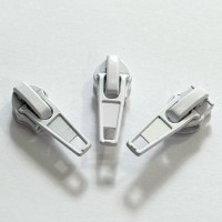 Curseur pour fermeture éclaire chaine continue spiralée 6,4mm BLANC