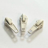 Curseur pour fermeture éclaire chaine continue spiralée 6,4mm ECRU